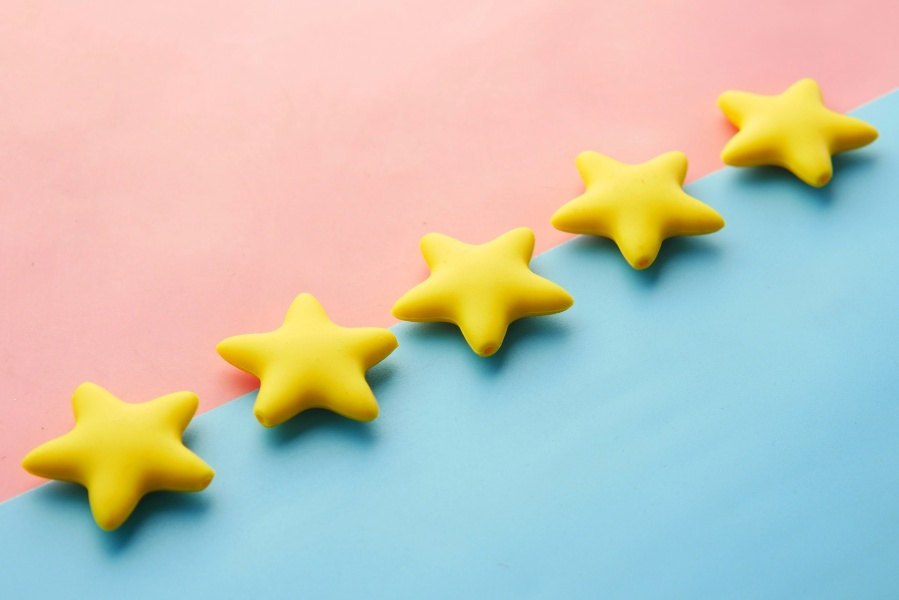 Yellow stars on a pink and blue background